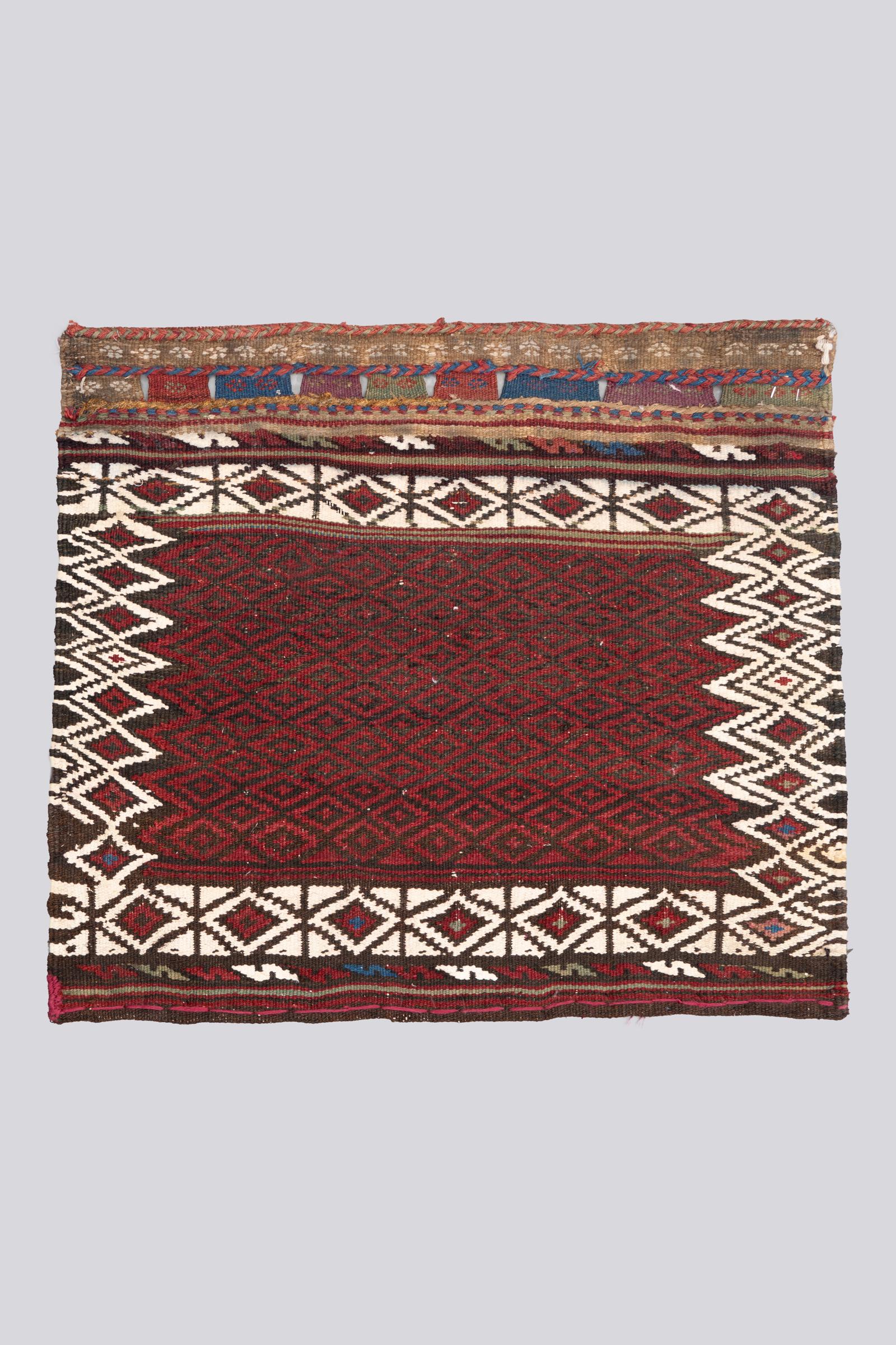 Antique Jabal Barez Soumak Saddle Bag face