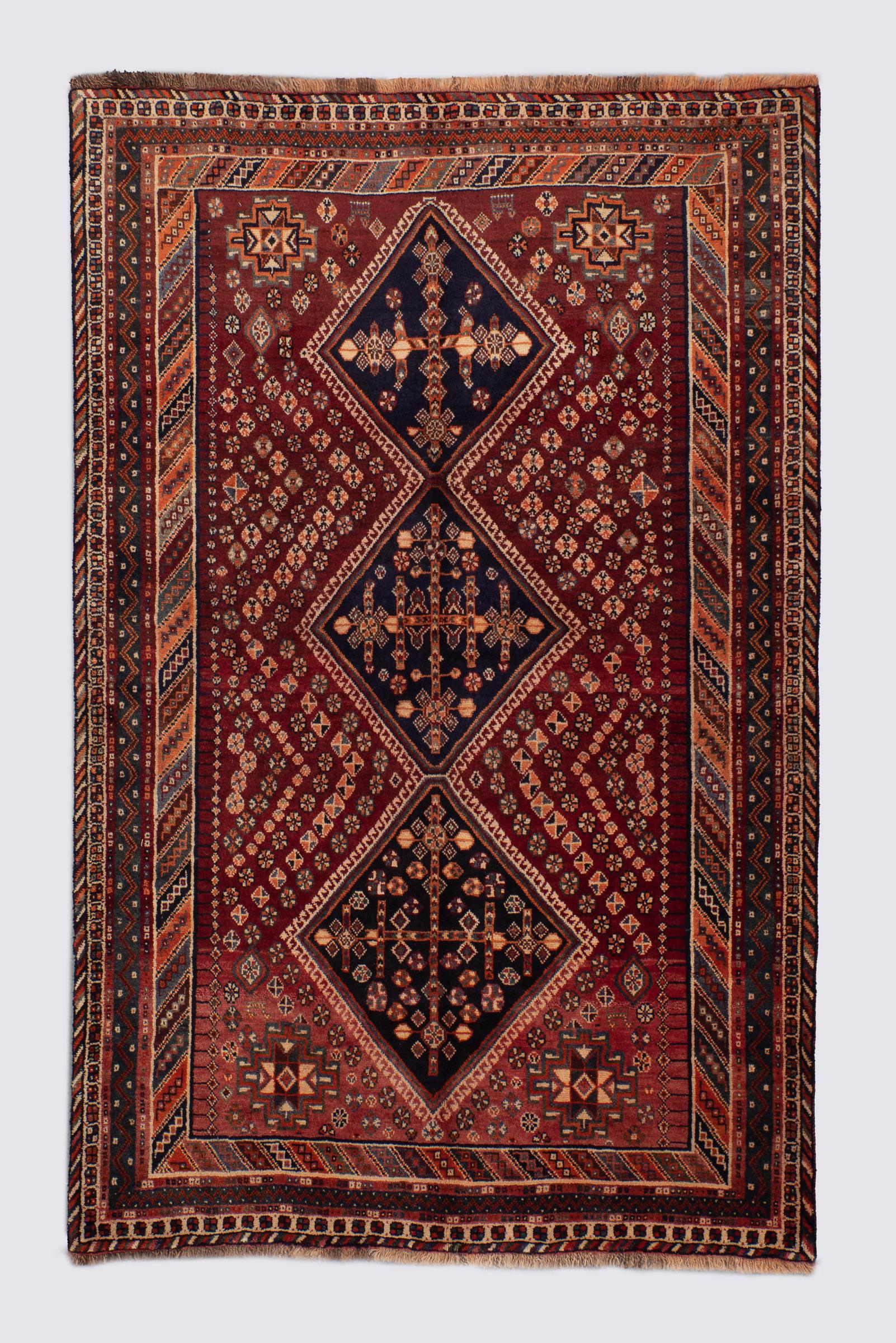 Qashqai triple-medallion rug